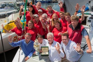 Roger Hickman, Owner Wild Rose, and crew receive the Tattersall's Cup and a Rolex Timepiece. Front row: Jean-Nöel Bioul, Rolex SA, John Cameron, Commodore Cruising Yacht Club of Australia, Roger Hickman, Richard Batt,  Commodore Royal Yacht Club of Tasmania.